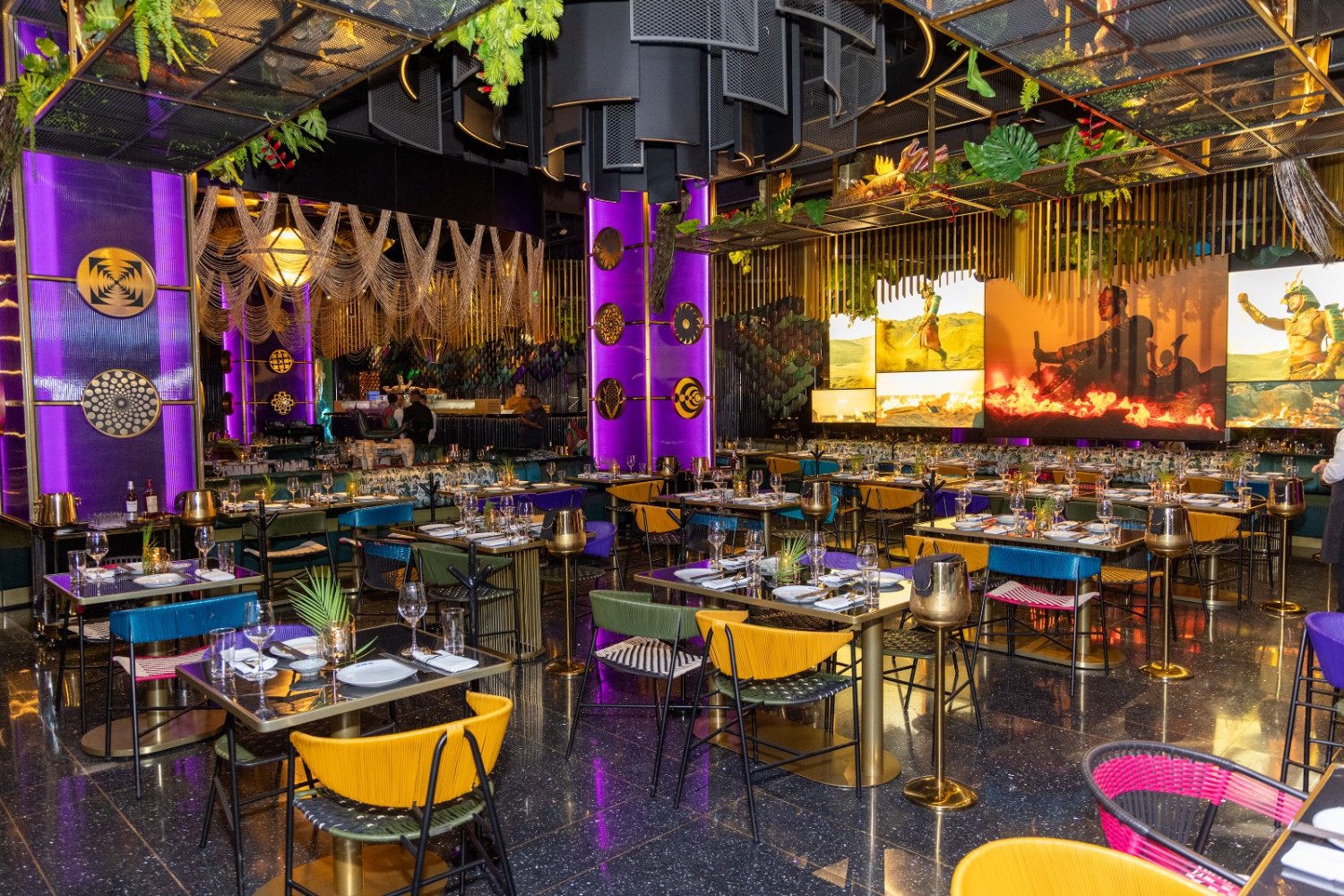 CVICHE restaurant interior with four-person tables and richly designed interior